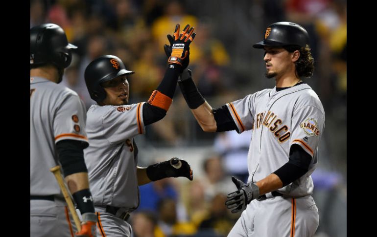 El mexicano Ramiro Peña, tercera base de San Francisco, bateó dos hits en cuatro turnos. AFP / J. Sargent
