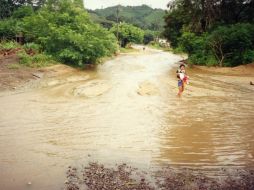 Cuando la camioneta fue arrastrada, dos niños y dos adultos murieron ahogados. EL INFORMADOR / ARCHIVO