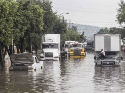 En la colonia San Miguel Xochimanga el agua alcanzó en algunos puntos hasta 60 centímetros de altura. EL INFORMADOR / ARCHIVO