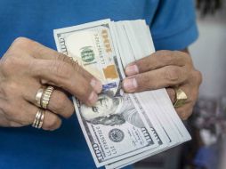 El Banxico informa que el tipo de cambio para solventar obligaciones es de 18.9113 pesos. EL INFORMADOR / ARCHIVO