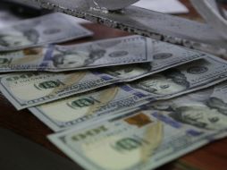 Para este miércoles, la institución financiera prevé que el tipo de cambio cotice entre 18.63 y 18.74 pesos por dólar. EL INFORMADOR / ARCHIVO