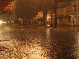 La mayor afectación fue en el poblado de La Primavera, donde un canal se desbordó por el tapamiento de un ducto. SUN / ARCHIVO
