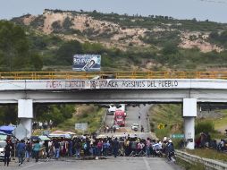 La visita viene 'un poco tarde', pues muchas evidencias ya no están en el lugar, lamenta Comisión de Gobernabilidad de la población. AFP / R. Schemidt