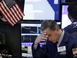 El índice compuesto Nasdaq terminó la jornada con retroceso. AFP / R. Drew