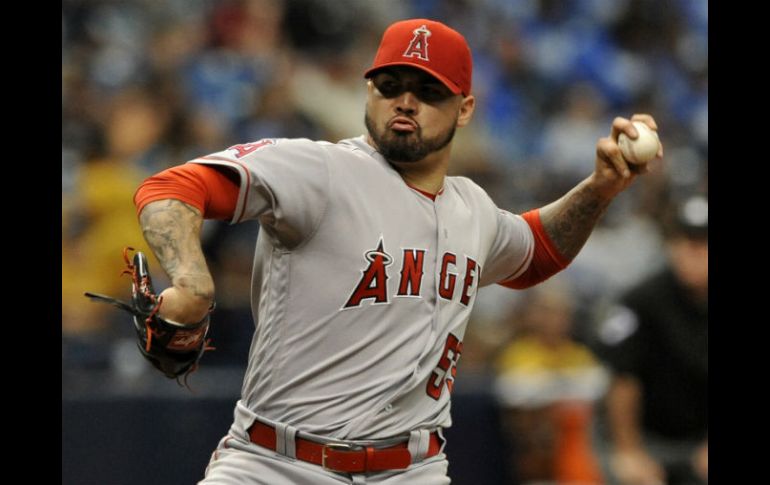 Héctor Santiago se llevó la victoria. Lanzó siete entradas, permitió tres hits, otorgó cuatro bases por bolas y nueve ponches. AP /  S. Nesius