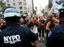Elementos de la policia de Nueva York vigilando el orden durante la manifestación contra la brutalidad Policial. EFE / ARCHIVO