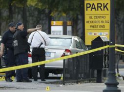 El Mandatario mexicano expresa su solidaridad con las familias de los cinco policías muertos la noche del jueves. AP / L. M. Otero