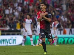 Golazo. El delantero rojinegro Martín Barragán celebra el tanto que abrió el marcador ayer en el Estadio Jalisco. MEXSPORT /