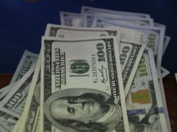 El tipo de cambio para solventar obligaciones denominadas en moneda extranjera es de 18.4597 pesos. EL INFORMADOR / ARCHIVO