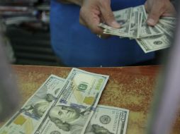 El Banxico informa que el tipo de cambio para solventar obligaciones denominadas en moneda extranjera es de 18.3006 pesos. EL INFORMADOR / ARCHIVO