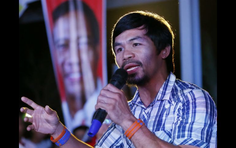 Pacquiao se mantuvo ausente durante casi un año luego de caer en mayo de 2015 ante Mayweather Jr. AP / B. Marquez