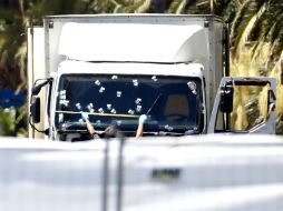 El autor del atentado es abatido por la policía; se encontró armamento al interior del vehículo que conducía. EFE / I. Langsdon