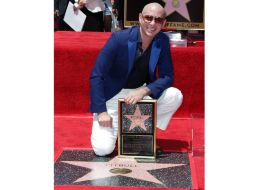 La estrella de Pitbull se encuentra a un costado de la Plaza de Celia Cruz, su artista favorito. AFP / V. Macon