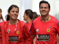 El jefe del Ejecutivo, acompañado de su hija Paulina durante la carrera de Molino del Rey. FACEBOOK / Enrique Peña Nieto