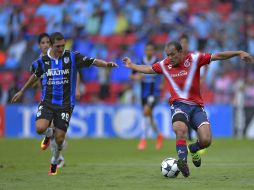 Acción del partido entre Gallos y Tiburones en el estadio La Corregidora. MEXSPORT / I. Ortiz