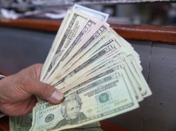 El tipo de cambio para solventar obligaciones en moneda extranjera pagaderas en el país es de 16.0950 pesos. EL INFORMADOR / ARCHIVO