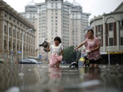 Se trata de las peores inundaciones de los últimos años, que se ven alimentadas por constantes chaparrones. AP / Chinatopix