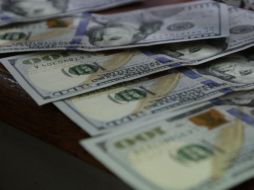 El tipo de cambio para solventar obligaciones denominadas en moneda extranjera es de 18.6089 pesos. EL INFORMADOR / ARCHIVO