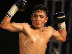 El 'Goofy' Montes acudió ayer al Mercado de Abastos, donde subió a la romana para marcar un peso de 58 kilogramos. ESPECIAL /