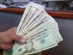 Banxico indica que el tipo de cambio para solventar obligaciones denominadas en moneda extranjera es de 18.7569 pesos. EL INFORMADOR / ARCHIVO