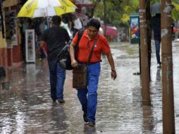 Recomiendan mantenerse alerta ante posibles inundaciones. SUN /