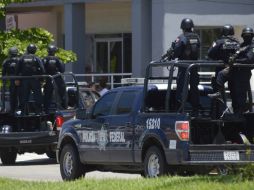 Al lugar donde ocurrió los hechos acudieron elementos de las policías municipal, estatal, federal y militares. SUN / ARCHIVO