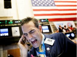 El Dow Jones de Industriales desciende 90.74 puntos y termina 18 mil 313.77 unidades. EFE / J. Lane