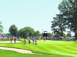 TPC at River Highlands. Varios golfistas realizan una sesión de práctica previo al arranque del torneo Travelers Championship. AP /