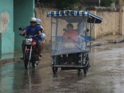 Nublados y lluvias de diferente intensidad se esperan para hoy en el país. EFE / C. Moreno