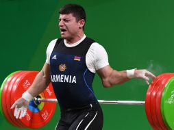 El sufrimiento de Karapetyan se hizo notar inmediatamente con los fuertes gritos de dolor. AFP / G. Chai Hin