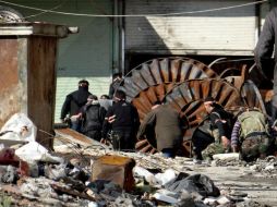 En Alepo, controlada según los sectores por las distintas partes del conflicto, permanecen dos millones de civiles. AP / ARCHIVO