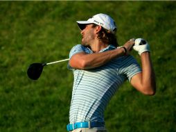 Andrew Loupe realiza un tiro en el hoyo 10 durante la primera ronda del torneo John Deere Classic. AFP / M. Cohen