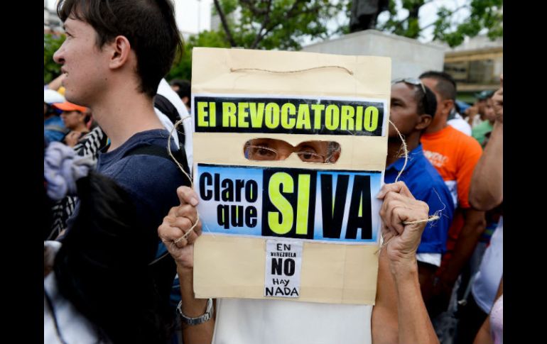 Evitar una confrontación entre el gobierno venezolano y aquellos que buscan sacar a Maduro requiere apoyo internacional, dicen. AFP / ARCHIVO