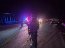 Personal de distintas dependencias apoyan en la seguridad de la zona para evitar cualquier delincuencial. AFP / H. Guerrero