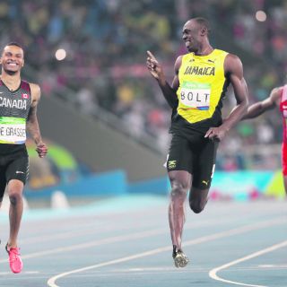 Usain Bolt va por la segunda medalla de oro