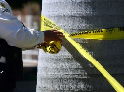 Al sitio acudieron elementos de la Policía del Mando Único y agentes de Investigación Criminal de la Fiscalía. EL INFORMADOR / ARCHIVO