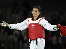 María del Rosario Espinoza celebra luego de ganar por superioridad a la de Estados Unidos. AP / A.Medichini