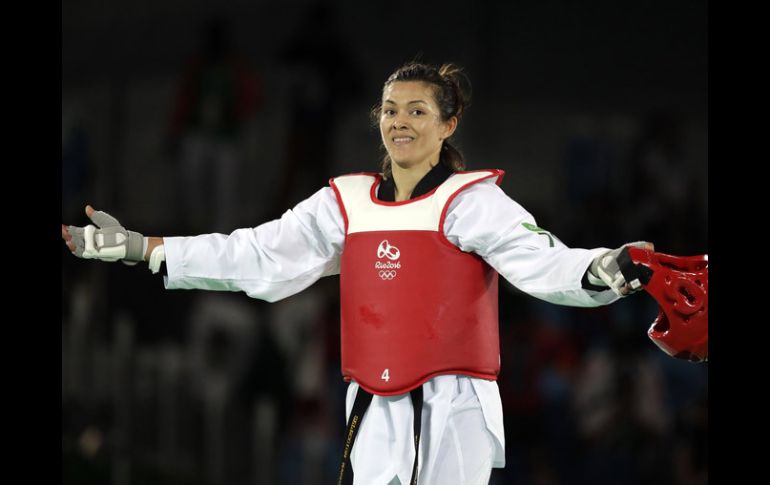 María del Rosario Espinoza celebra luego de ganar por superioridad a la de Estados Unidos. AP / A.Medichini