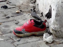 Entre los civiles muertos figuran 313 niños. AP /