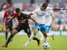 Acción del partido entre Atlas y Cruz Azul en el Estadio Jalisco. MEXSPORT / C. de Marchena