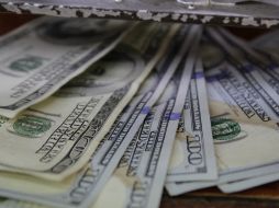 El tipo de cambio para solventar obligaciones en moneda extranjera pagaderas en el país es de 18 mil 5773 pesos. EL INFORMADOR / ARCHIVO