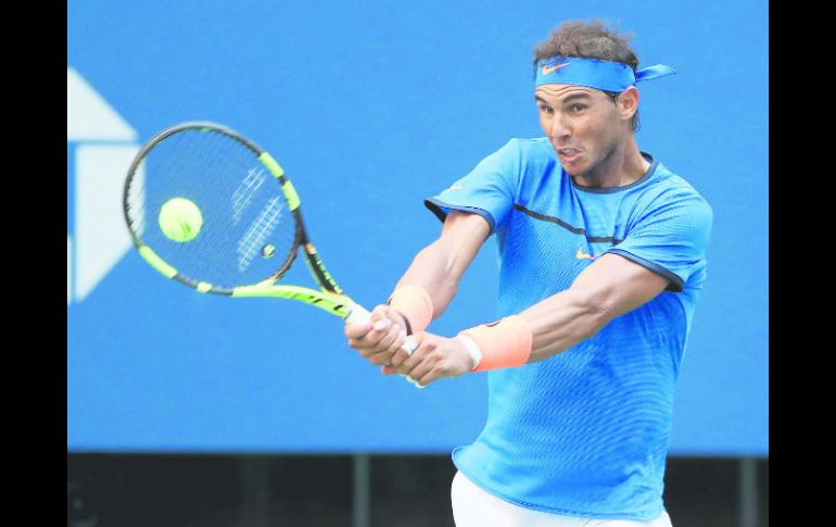 El español Rafael Nadal, cuarto cabeza de serie, regresa una bola a su primer rival en el Abierto de Estados Unidos, Denis Istomin. AFP /