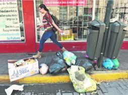 Desechos. Basura en Pedro Loza y Reforma; para denunciar acumulación de desperdicios se puede hacer al teléfono 070. EL INFORMADOR / A. García