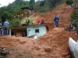 El deslizamiento de tierra y lodo tiene lugar en la comunidad de Santa Isabel II, del municipio de Villa Nueva, al sur de la capital. NTX / ARCHIVO