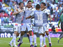 Jugadores del León celebran su triunfo ante Atlas. MEXSPORT / I. Ortiz