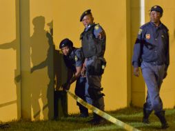 La Policía mantiene acordonados los alrededores de la comisaría y busca a más implicados. AFP / ARCHIVO