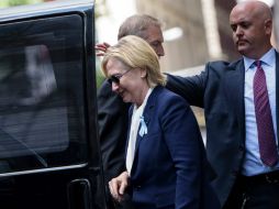 Clinton tuvo que retirarse de una ceremonia en NY en homenaje al 11-S. AFP / B. Smialowski