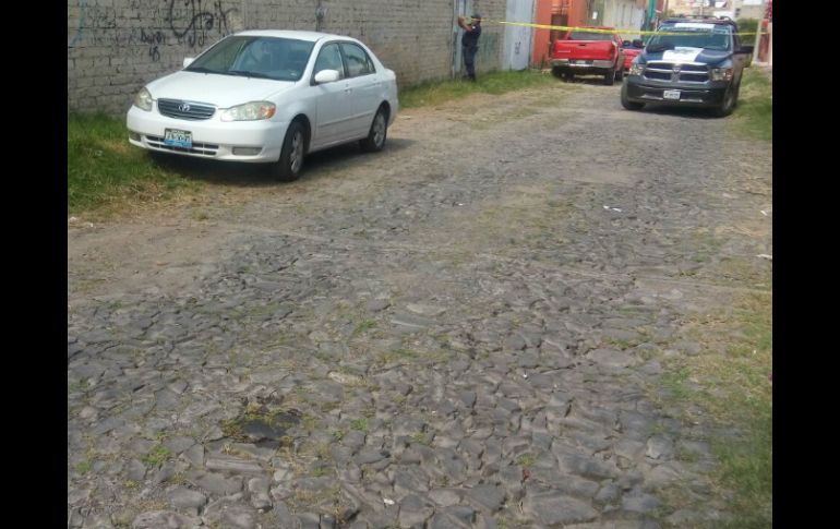 En el Centro de Tonalá se encontró a un hombre asesinado por arma punzocortante dentro la cajuela de un vehículo. ESPECIAL /