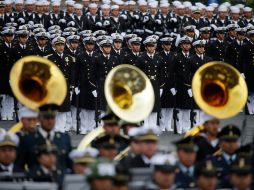 Las tropas ubicadas en la Plaza de la Constitución son supervisadas por el Presidente Peña Nieto. AP / R. Blackwell