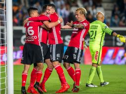 Jugadores de Tijuana celebran el empate que se dio en los últimos minutos. MEXSPORT / Emiliano